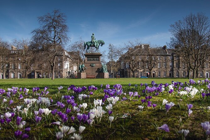 Edinburgh: Dean Village & New Town Walking Tour - George Street and The Dome: statues, dining energy, and Neoclassical details