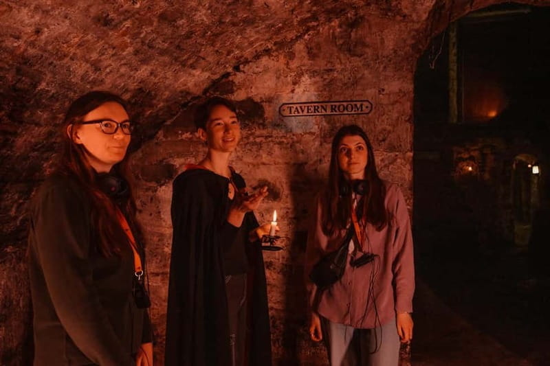 Edinburgh: Immersive Small-Group Haunted Underground Tour - Entering Old Town at Mercat Cross, then slipping into the dark