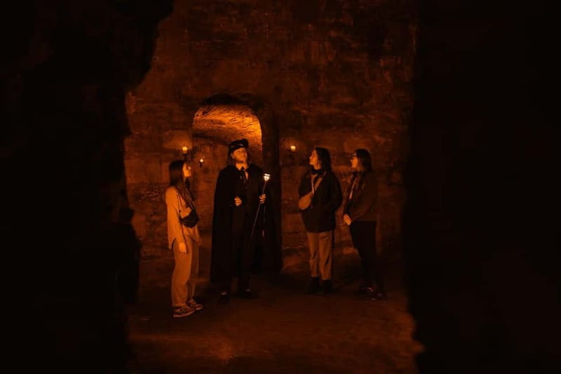Edinburgh: Underground Vaults and Graveyard Evening Tour - Canongate Graveyard at Canongate Kirk, famous names with gruesome endings